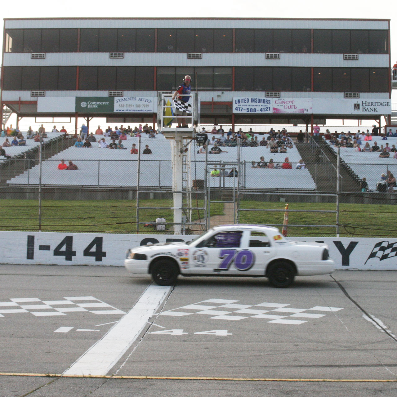 Evette Eickelmann of Eickelmann Racing winning her first race of the season at I-44 Speedway in Lebanon, Missouri, in the #70 Crown Vic stock car | May 31, 2025 | Photo by Tim Berrier