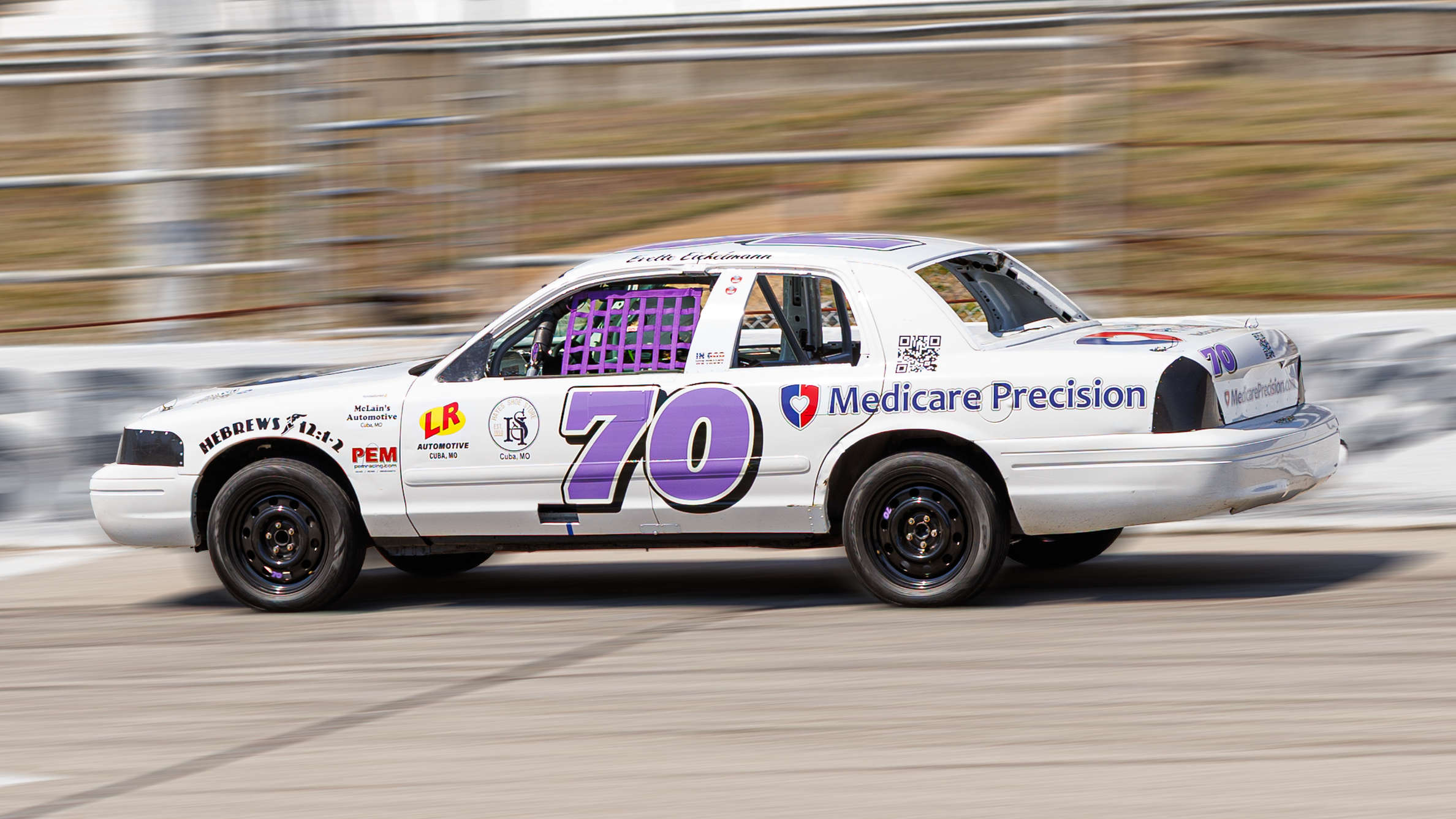 Evette Eickelmann of Eickelmann Racing driving the Medicare Precision #70 Crown Vic stock car at I-44 Speedway in Lebanon, Missouri | Photo by Philip Dudley Photo